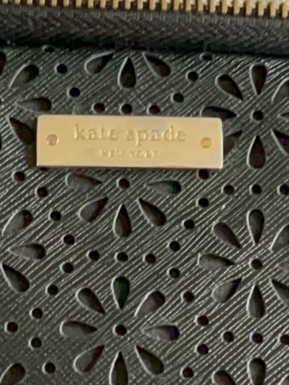 Kate Spade black perforated floral laptop sleeve for 13-inch devices